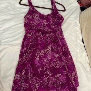 Semi formal dress in a pretty magenta color. Ruching on the top. Size 8 petite
